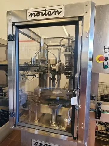 Capsulatrice Polilaminato Usata Nortan 750 bph